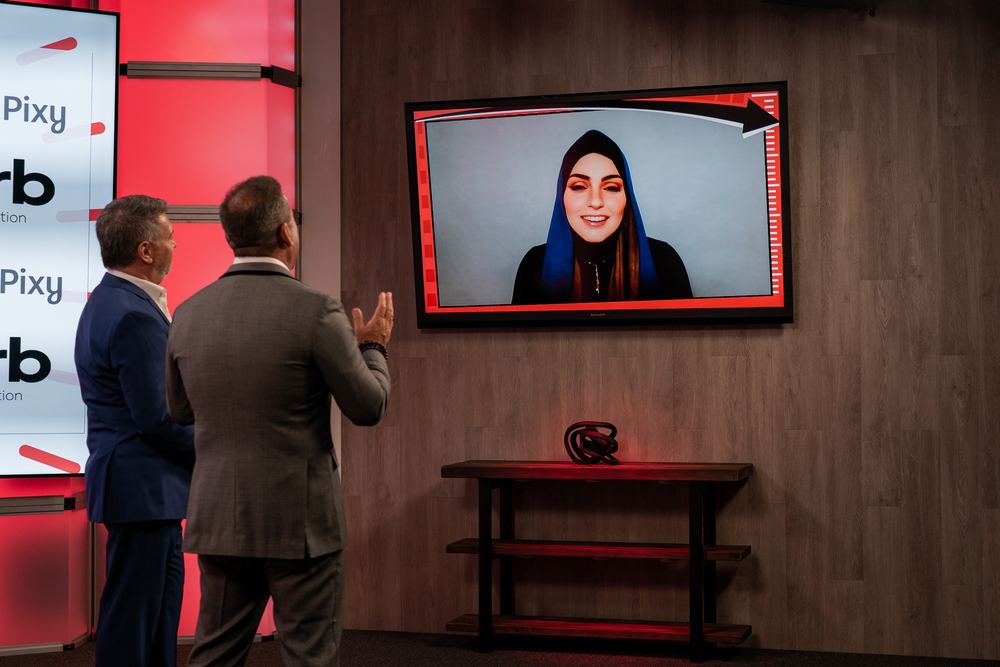 Alizar Tawil pitching RUUQ remotely to the hosts of 2 Minute Drill